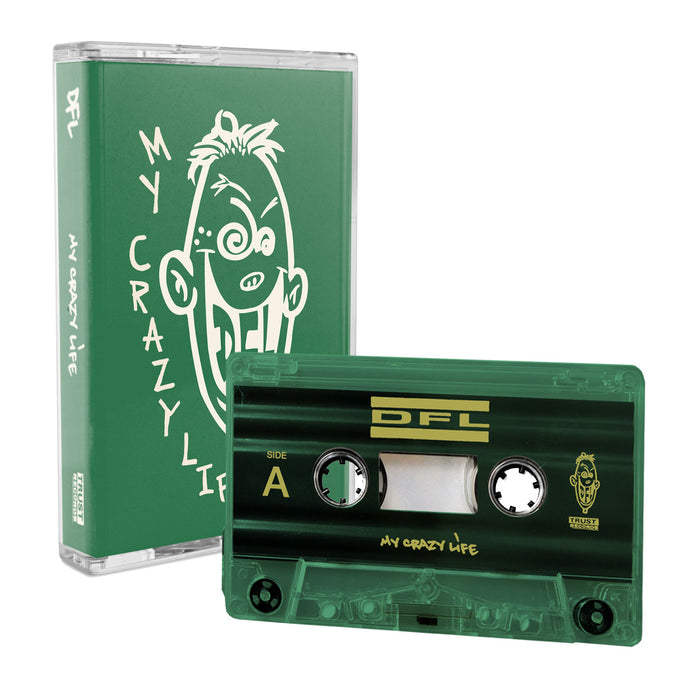 A green audio cassette from DFL, titled "My Crazy Life," displays a cartoon face and sits beside its matching green case, which features the same artwork and white title.